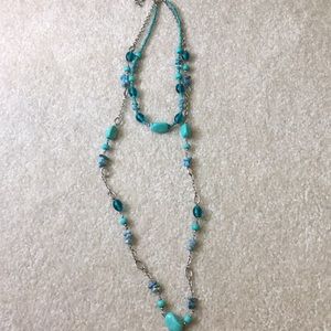 Double strand necklace.